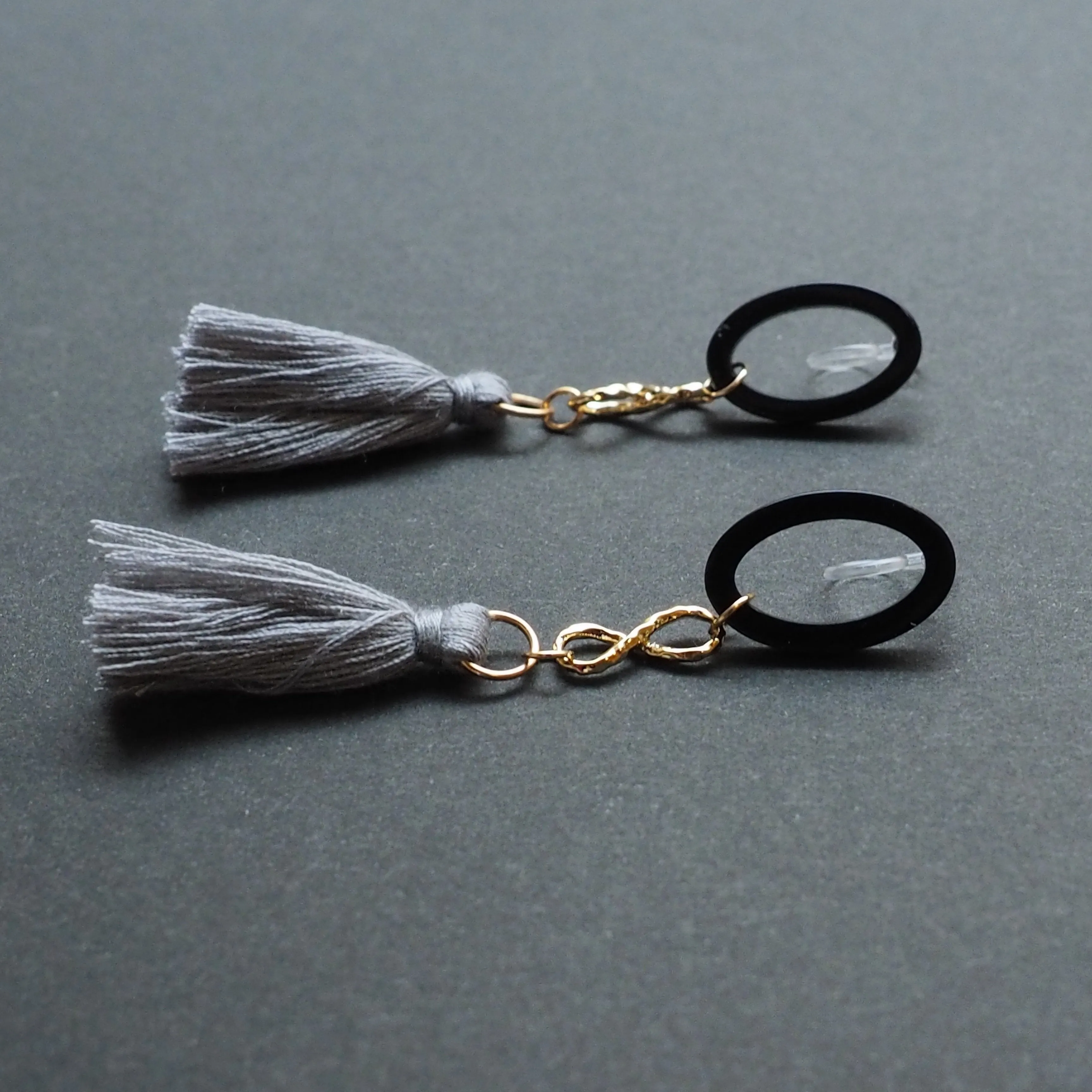 Black hoop with gray tassel invisible clip on earrings