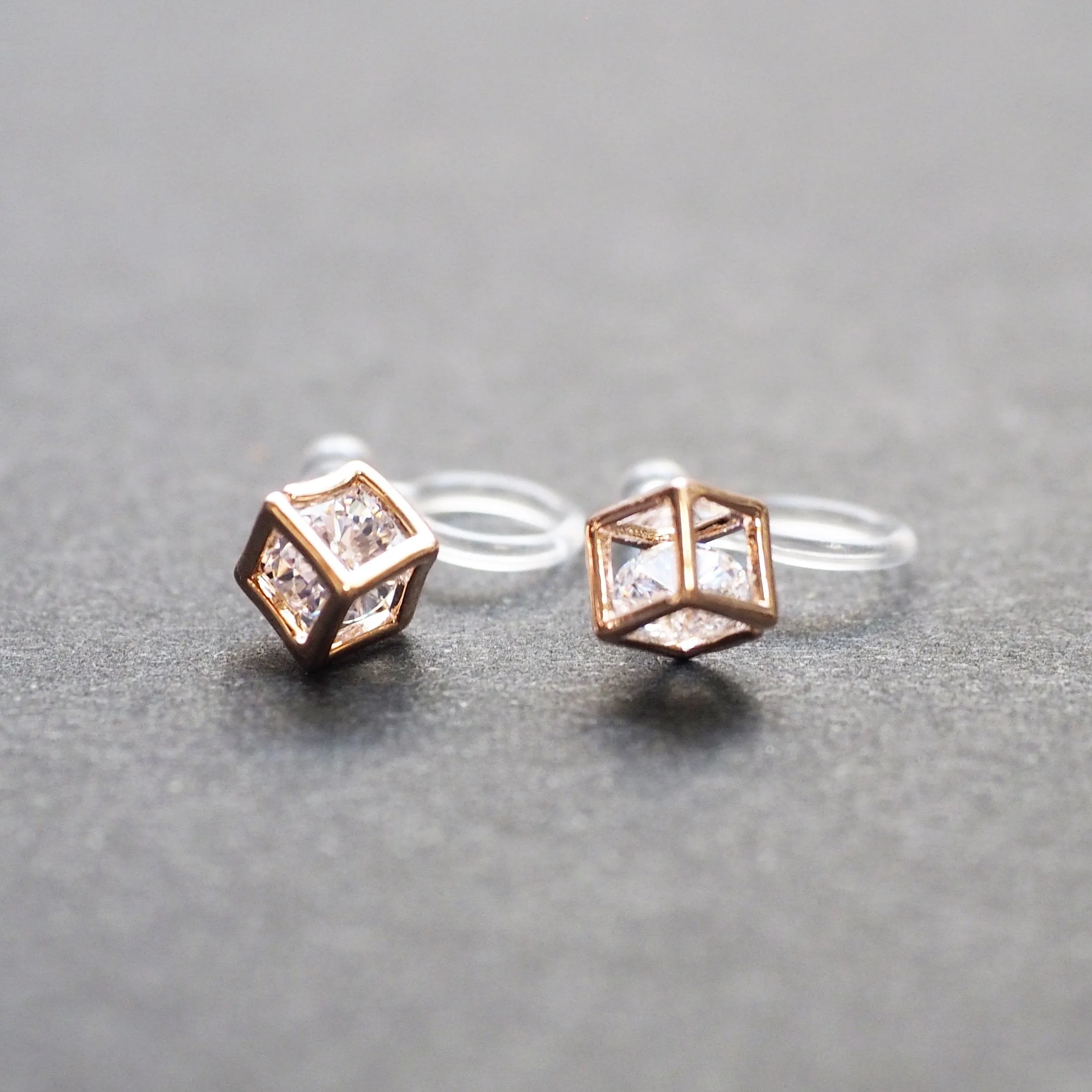 Cubic Zirconia Crystal In Cube Invisible Clip On Stud Earrings ( Rose gold tone )