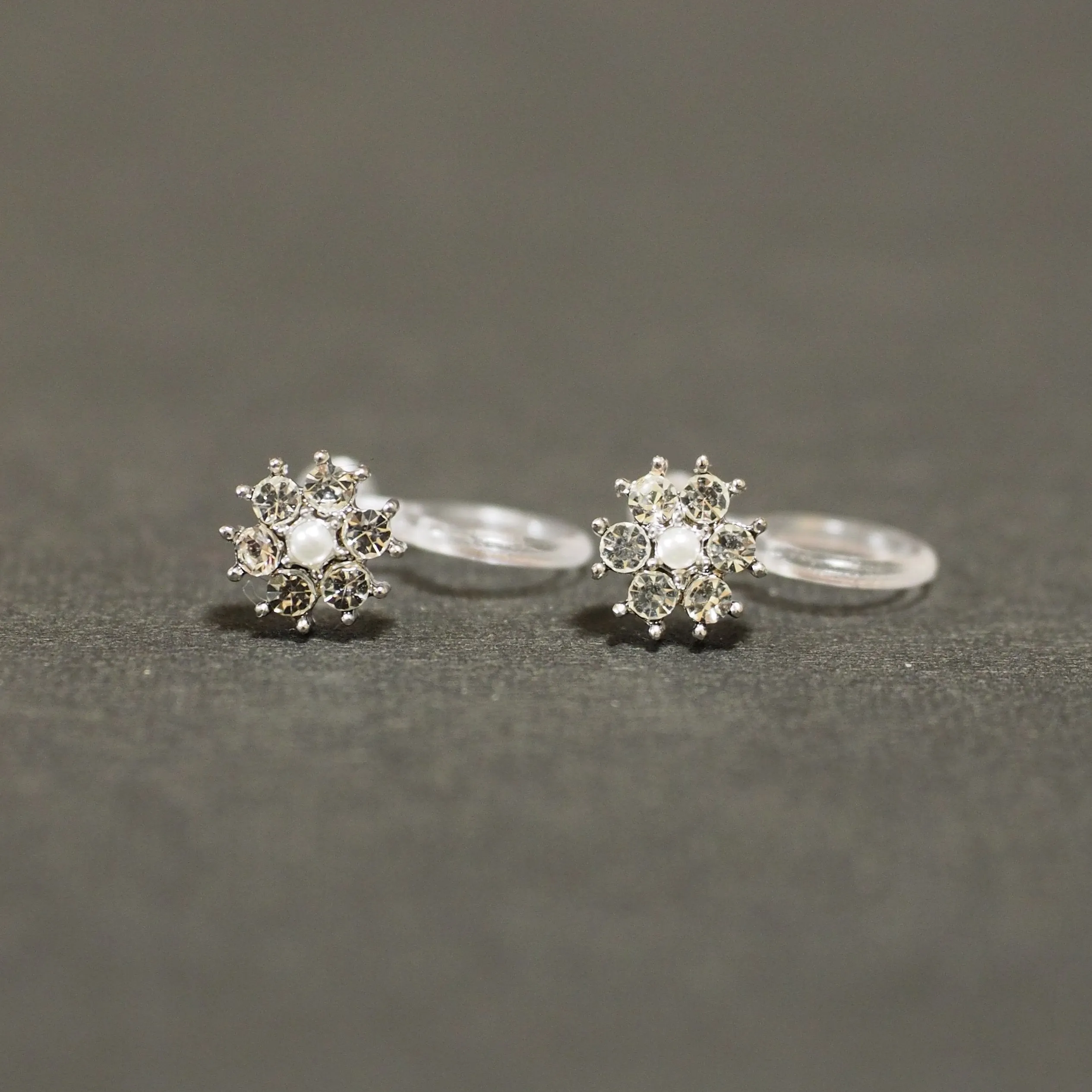 Flower Rhinestone Invisible Clip On Stud Earrings (Silver tone)