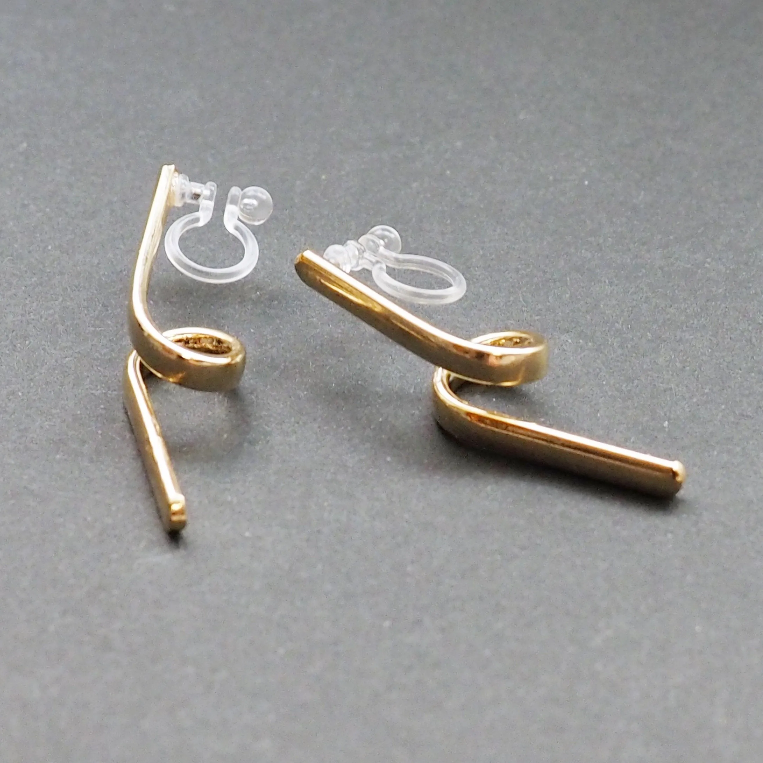 Gold Curved Bar Invisible Clip On Earrings