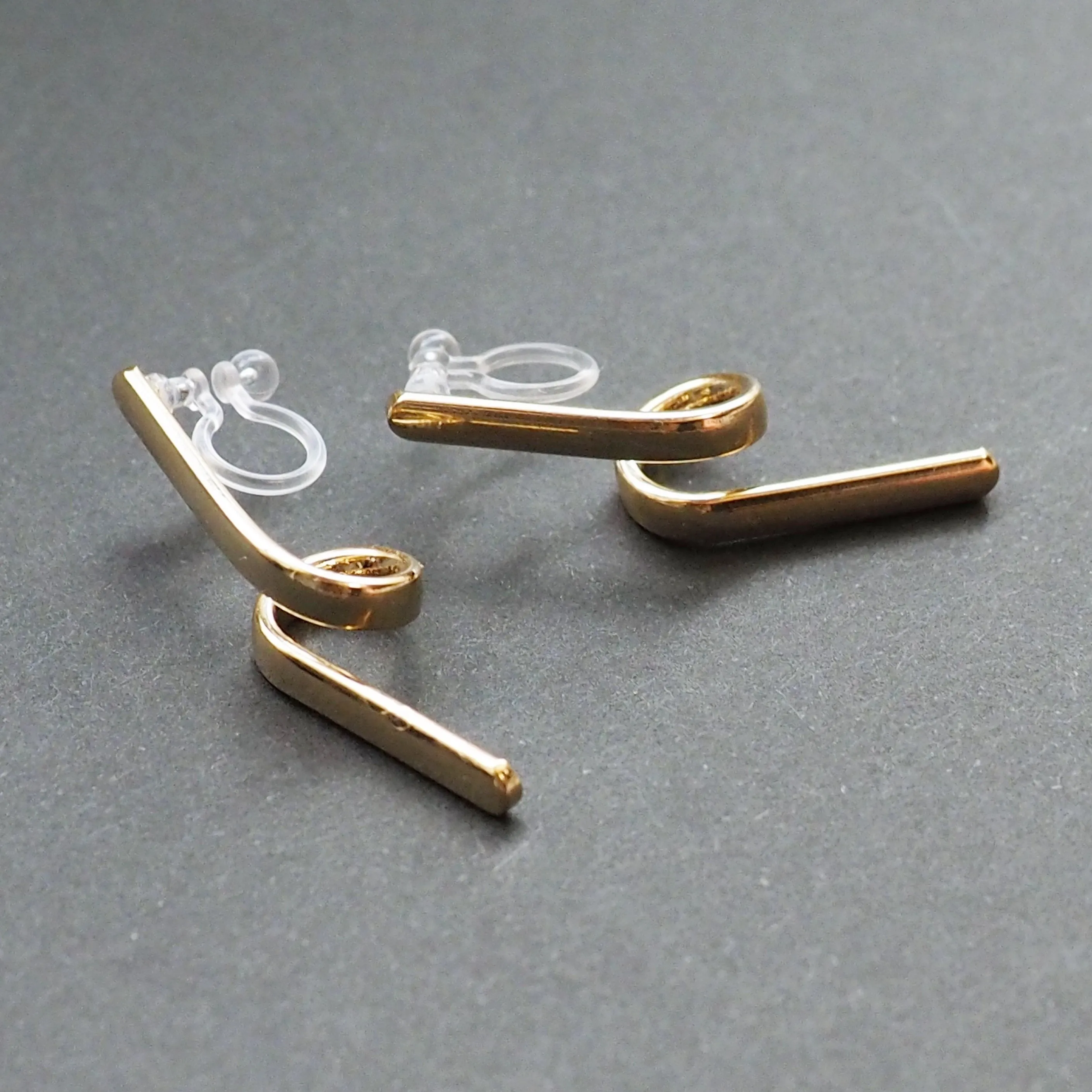 Gold Curved Bar Invisible Clip On Earrings
