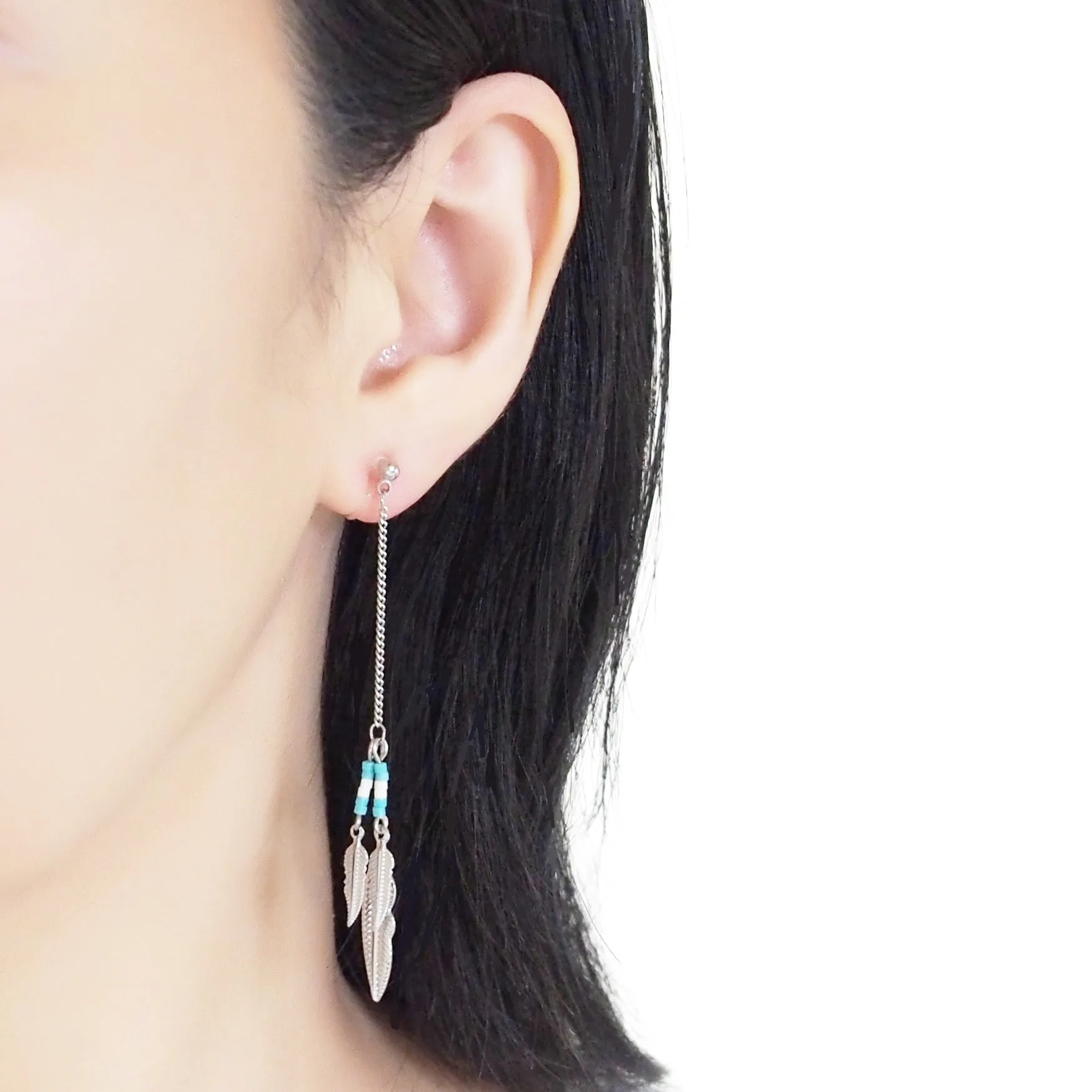 Long feather motif invisible clip on earrings ( Silver tone )
