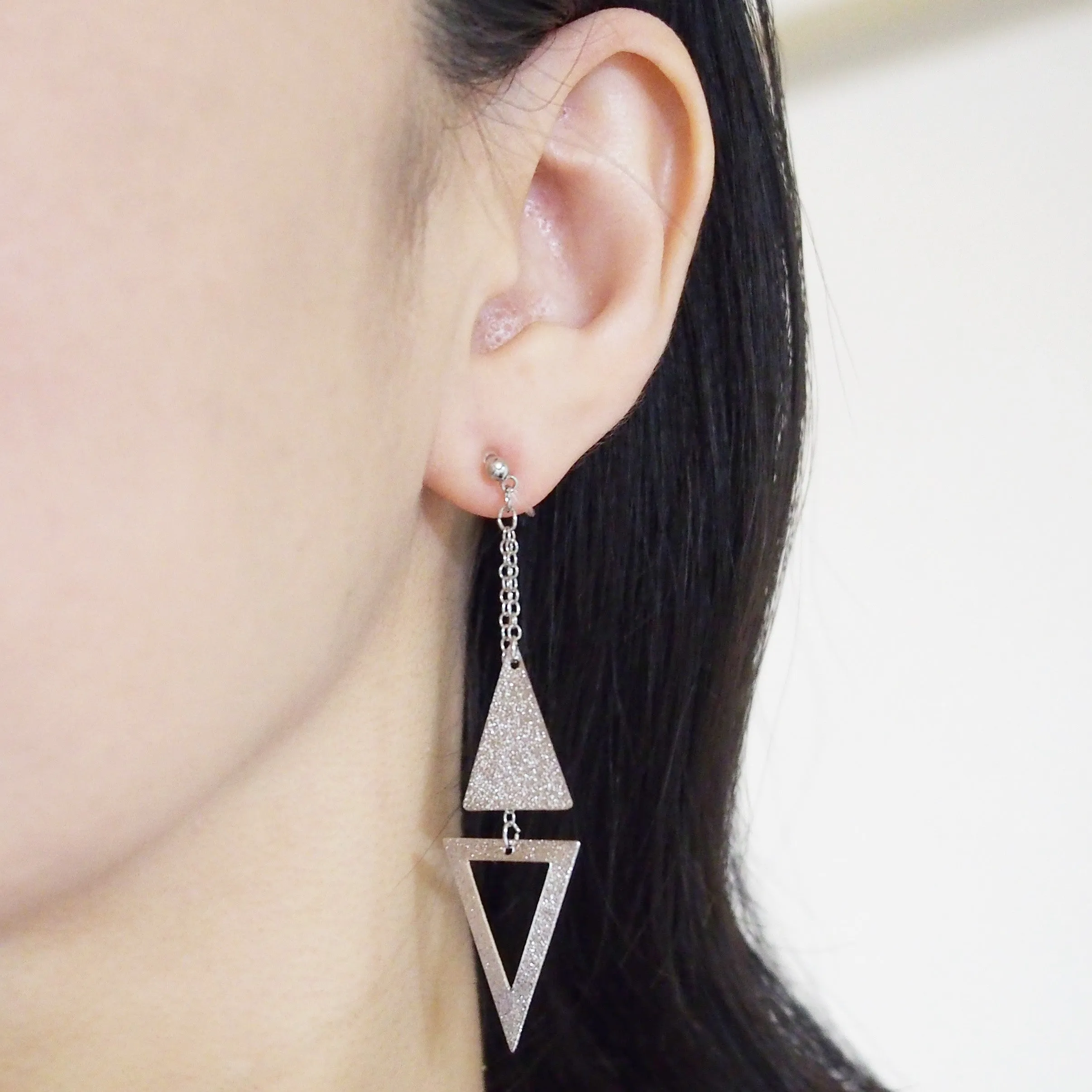 Metallic silver double triangle invisible clip on earrings