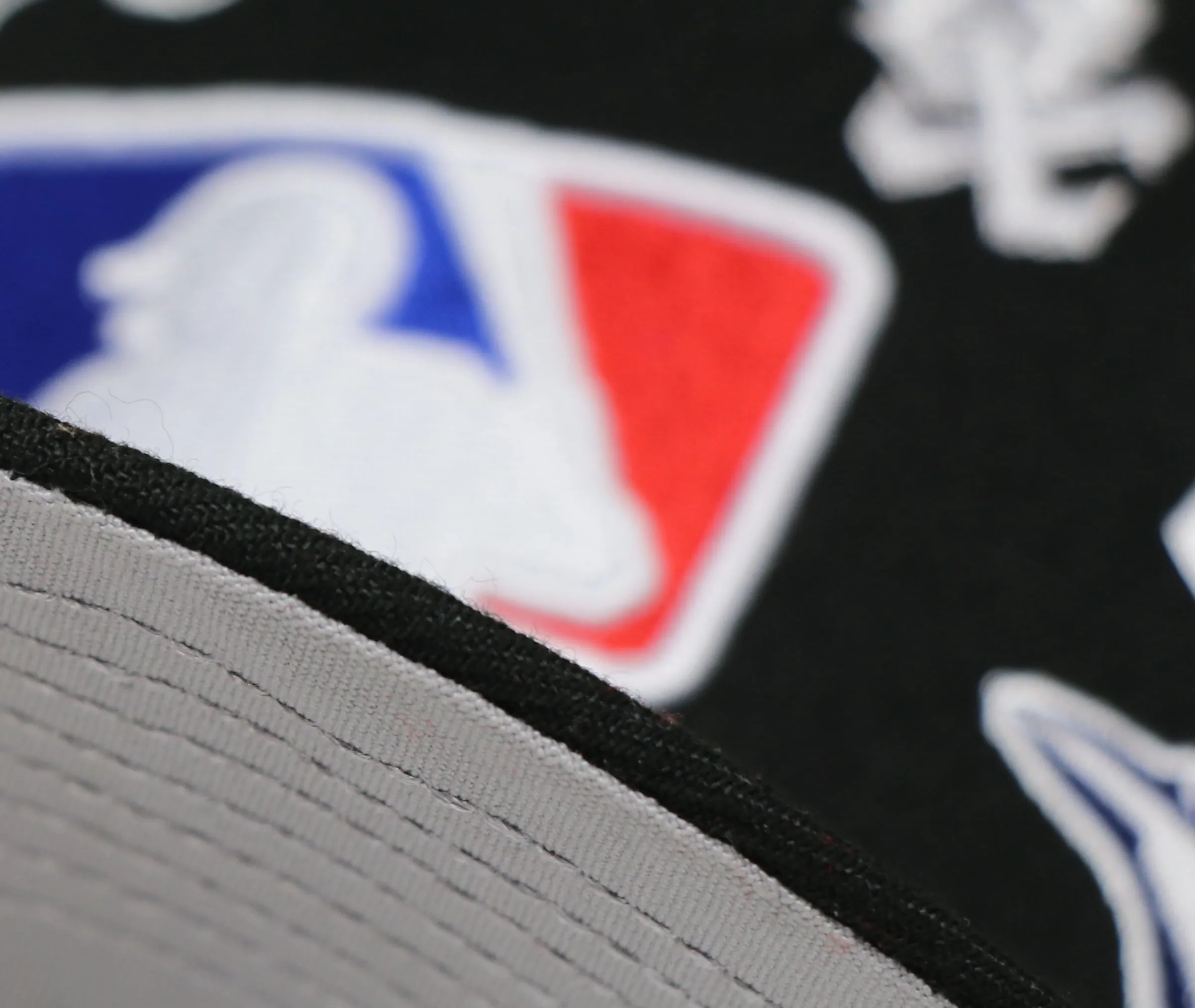 MLB ALL-OVER LOGO NEW ERA 59FIFTY FITTED