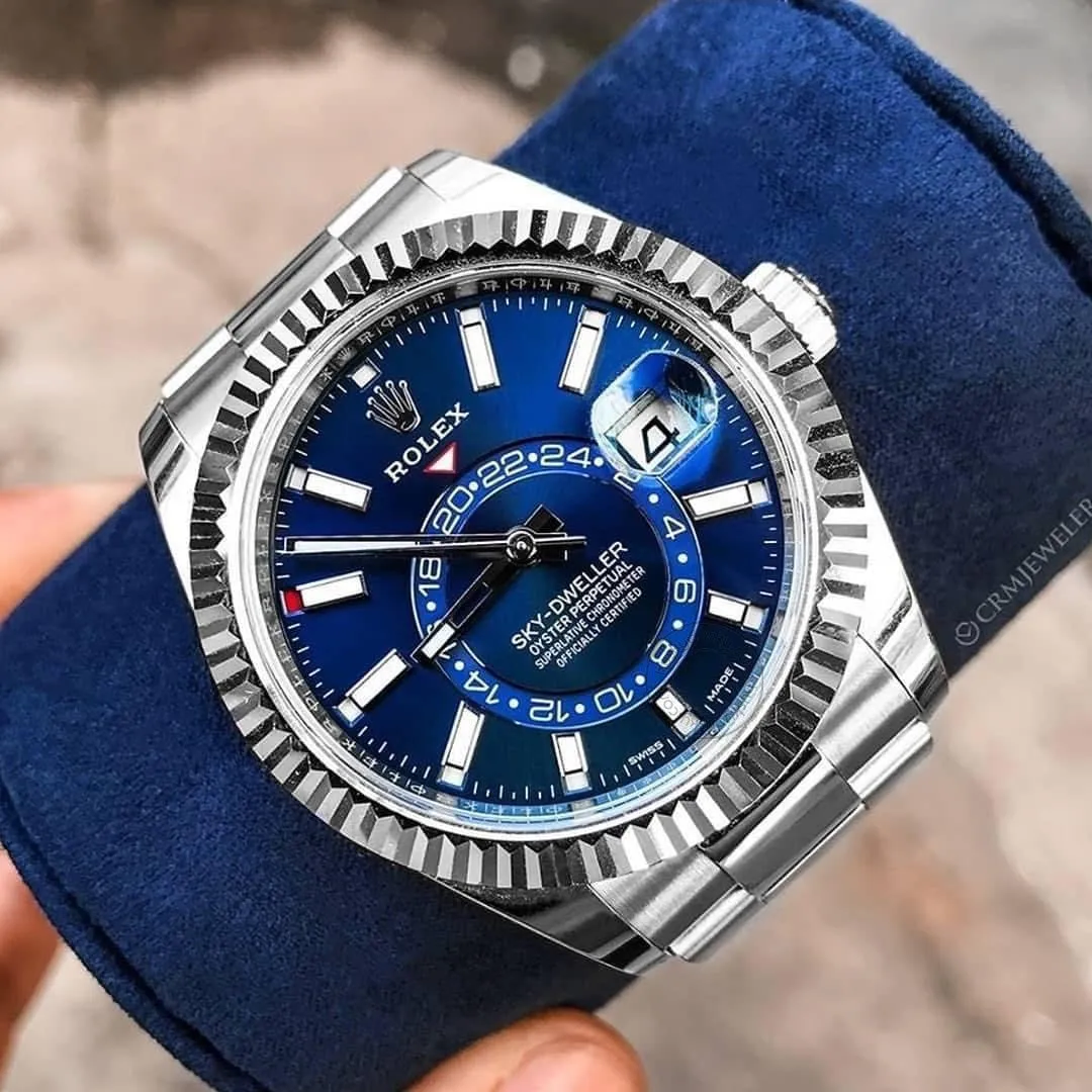 RLX The Oyster Perpetual Sky-Dweller in White Rolesor with a bright blue dial and an Oyster bracelet. RLX Sky-Dweller RLX-DWELLER