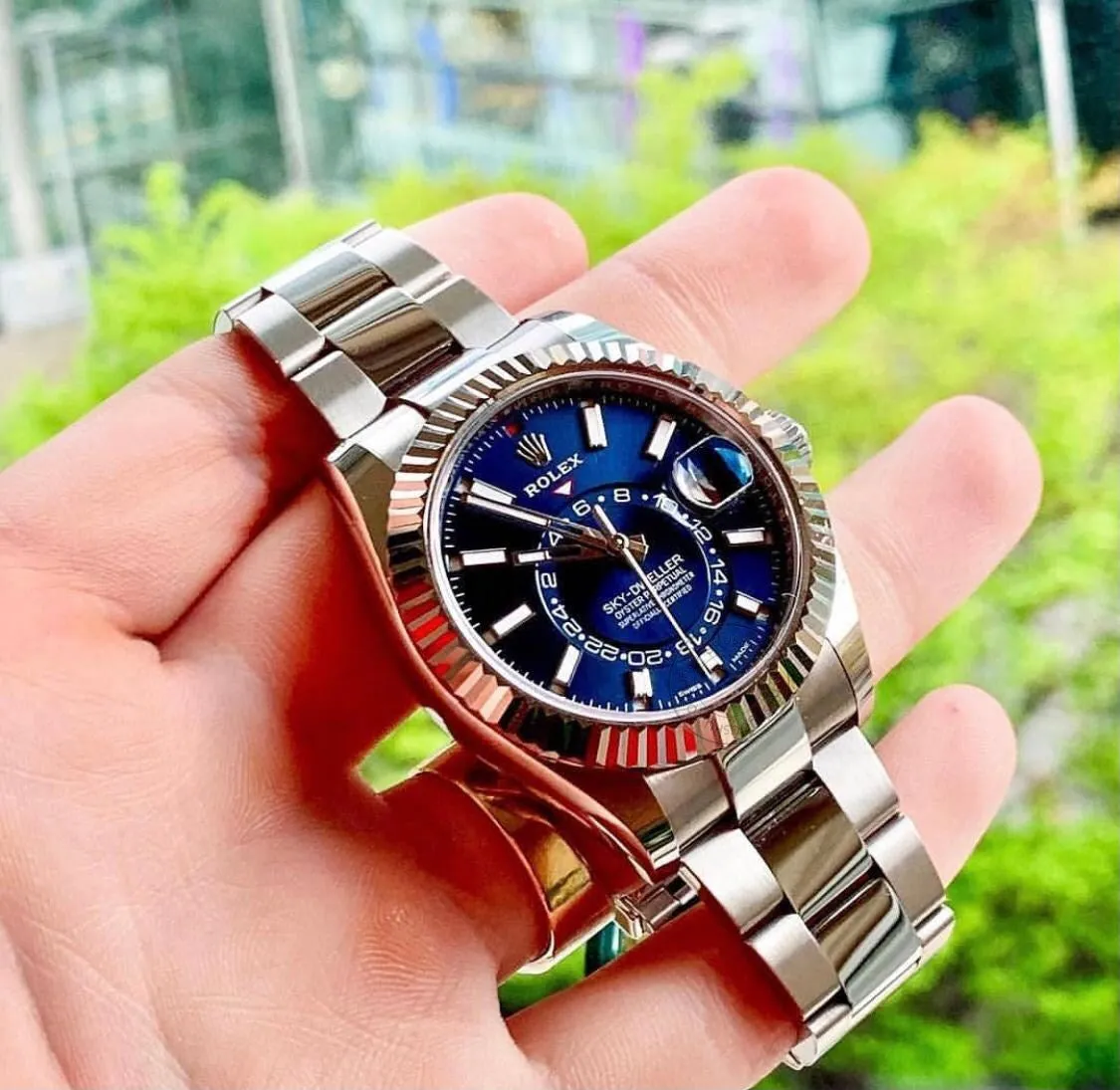 RLX The Oyster Perpetual Sky-Dweller in White Rolesor with a bright blue dial and an Oyster bracelet. RLX Sky-Dweller RLX-DWELLER