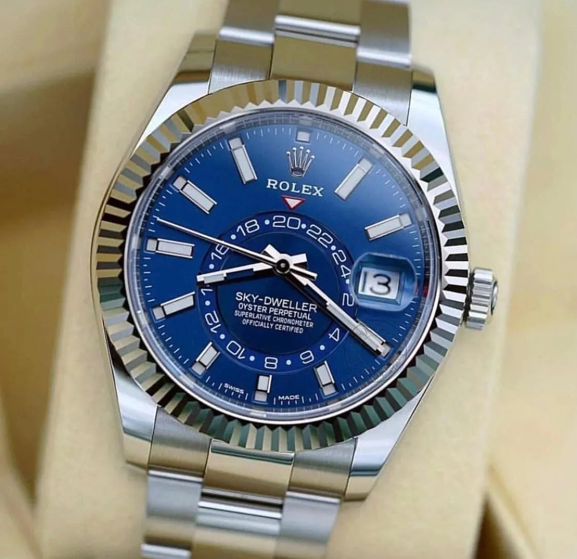 RLX The Oyster Perpetual Sky-Dweller in White Rolesor with a bright blue dial and an Oyster bracelet. RLX Sky-Dweller RLX-DWELLER