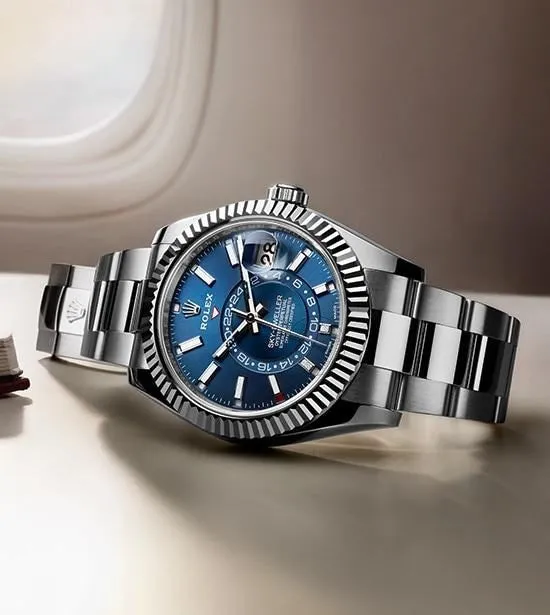 RLX The Oyster Perpetual Sky-Dweller in White Rolesor with a bright blue dial and an Oyster bracelet. RLX Sky-Dweller RLX-DWELLER