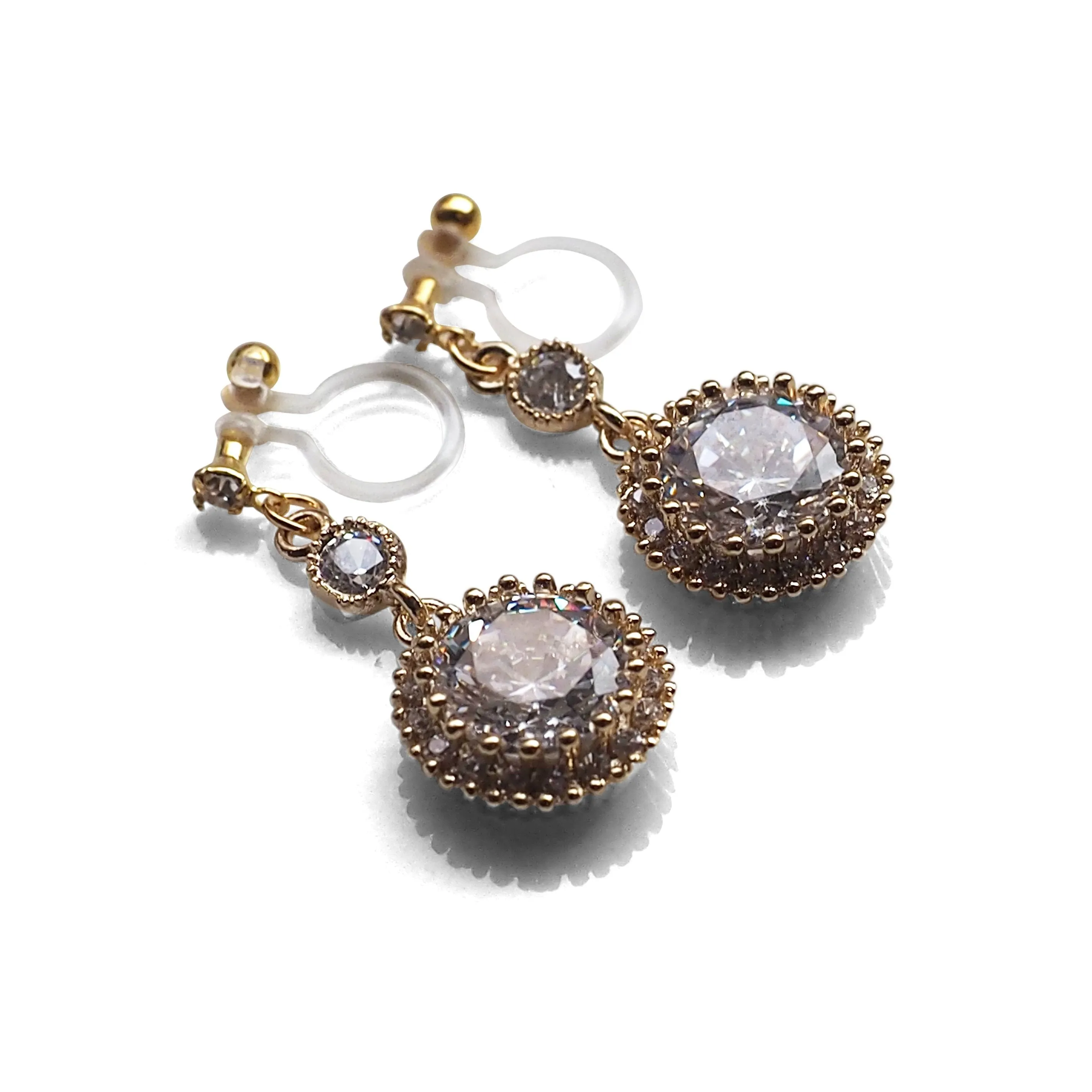 Round cubic zirconia invisible clip on earrings ( gold tone )