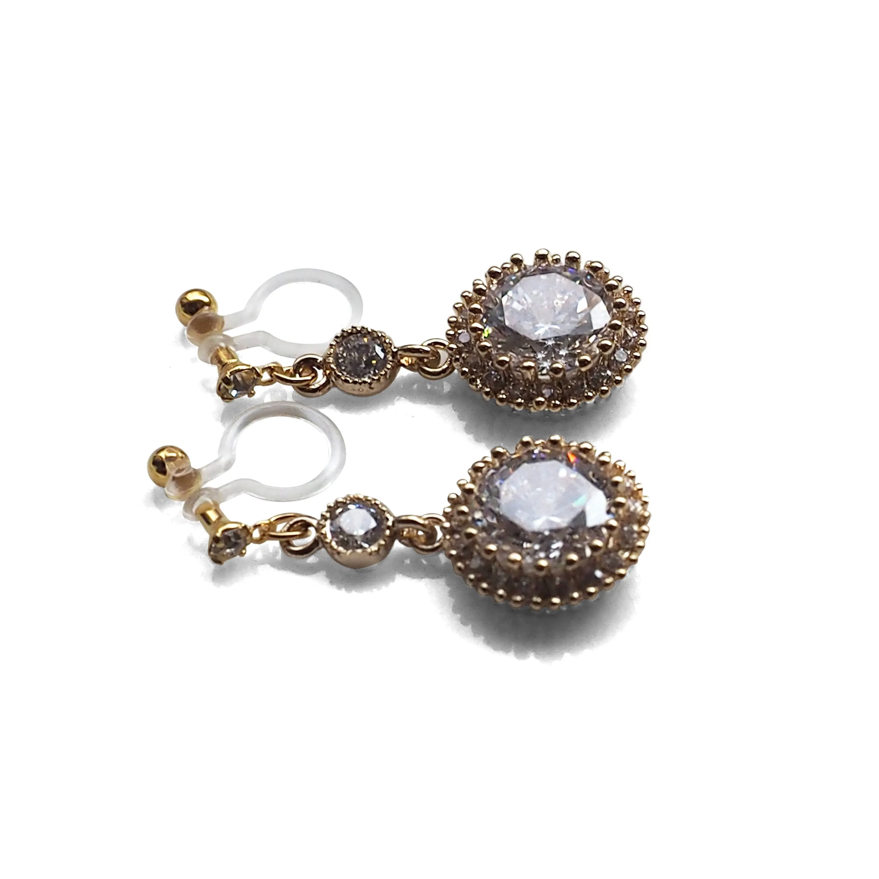 Round cubic zirconia invisible clip on earrings ( gold tone )