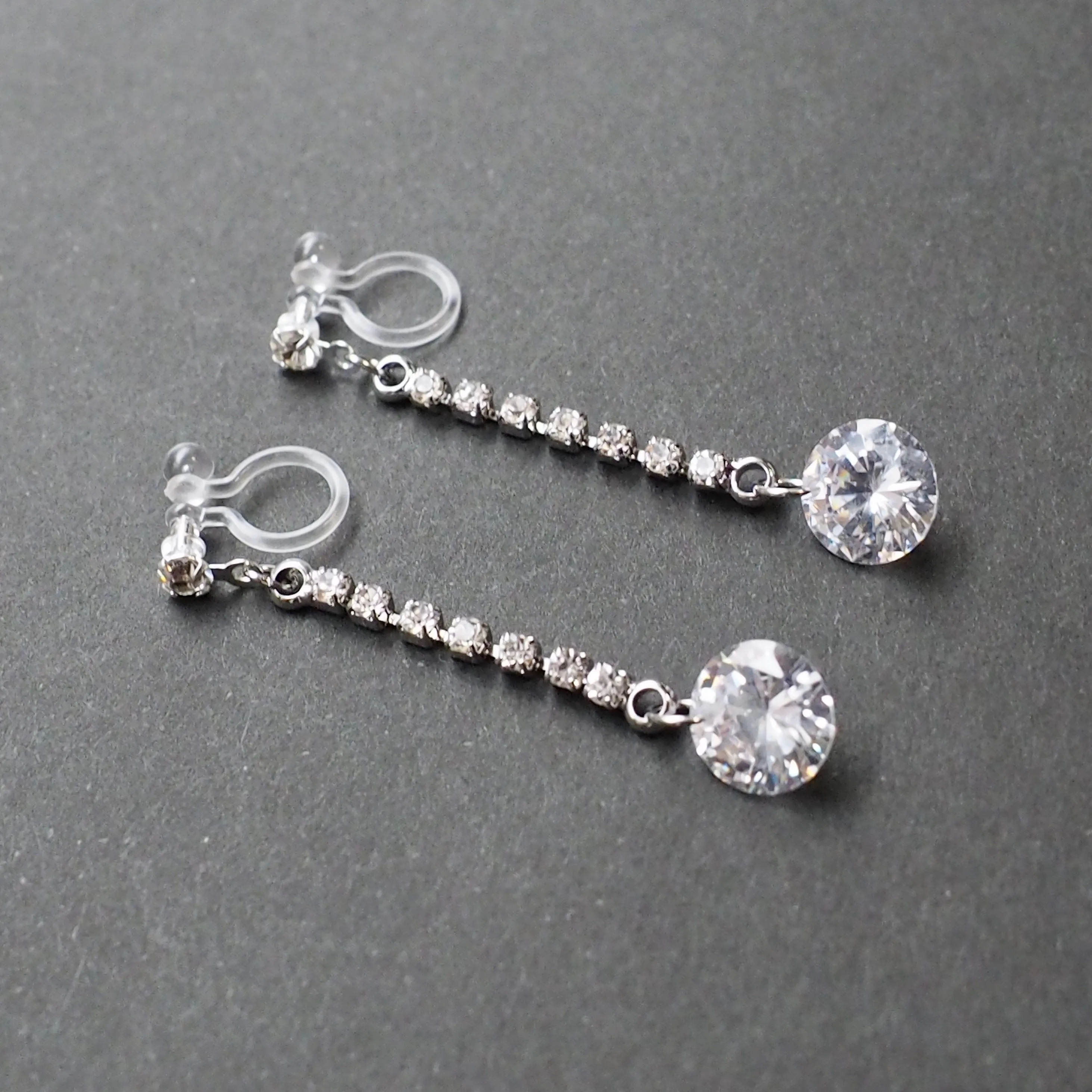 Silver cubic zirconia crystal dangle invisible clip on earrings