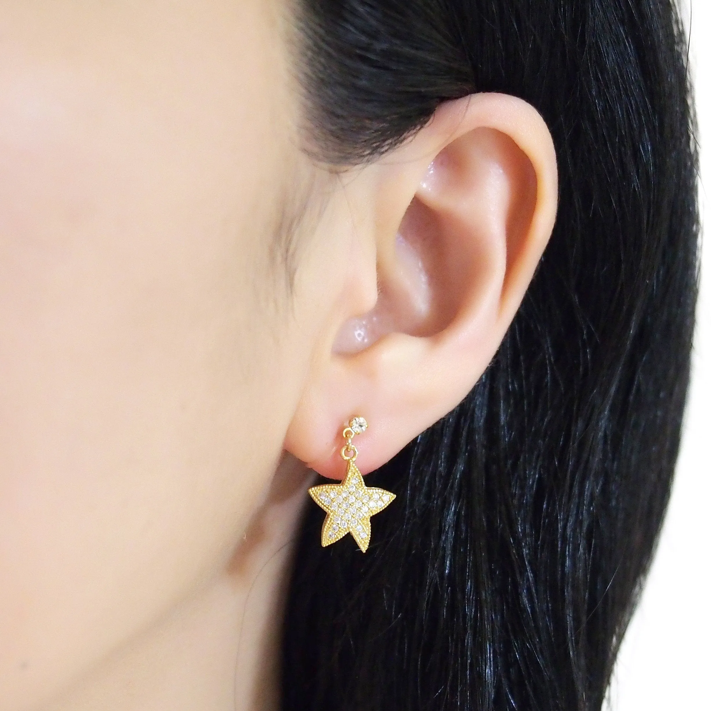 Star micro pave cubic zirconia invisible clip on earrings ( gold tone )