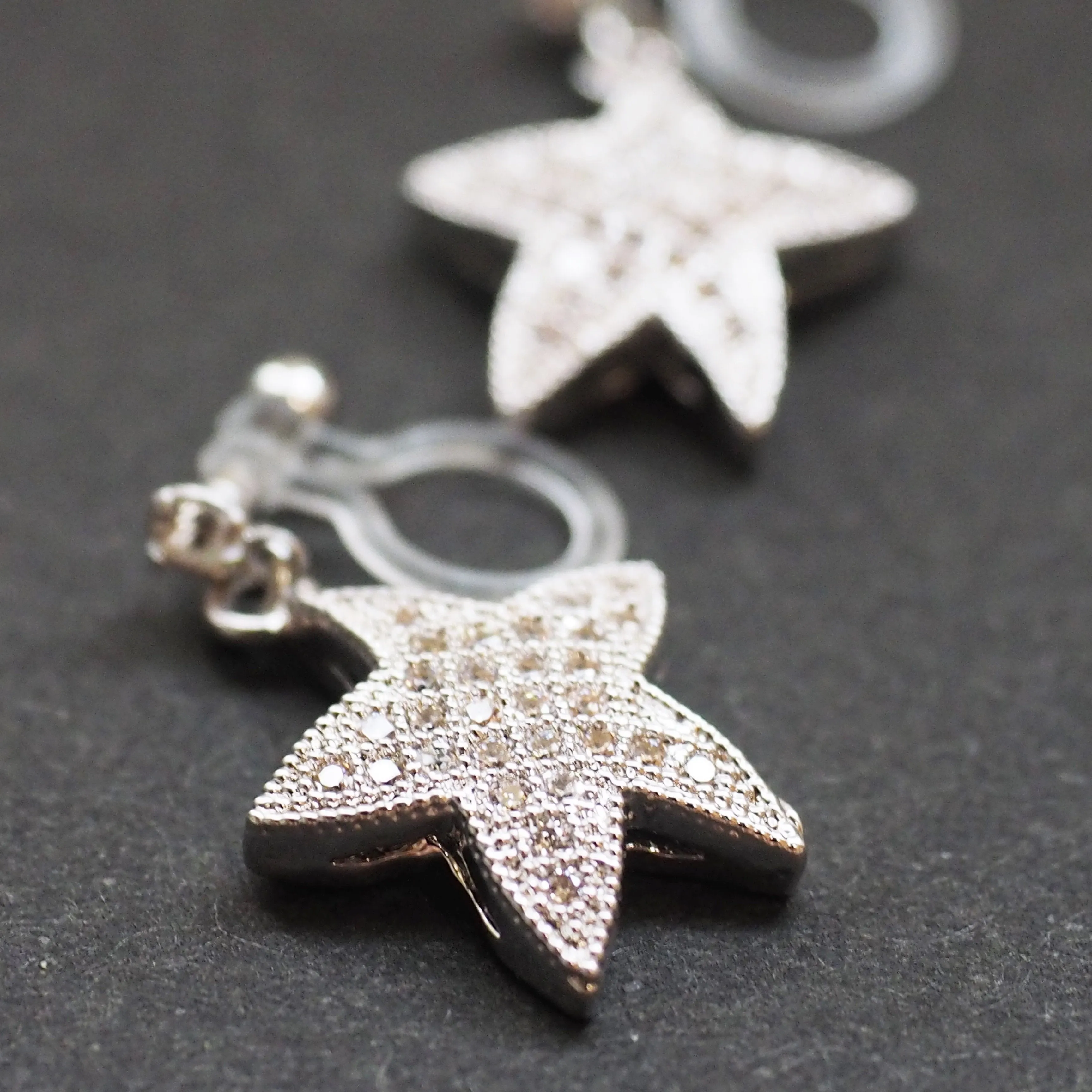 Star micro pave cubic zirconia invisible clip on earrings ( silver tone )
