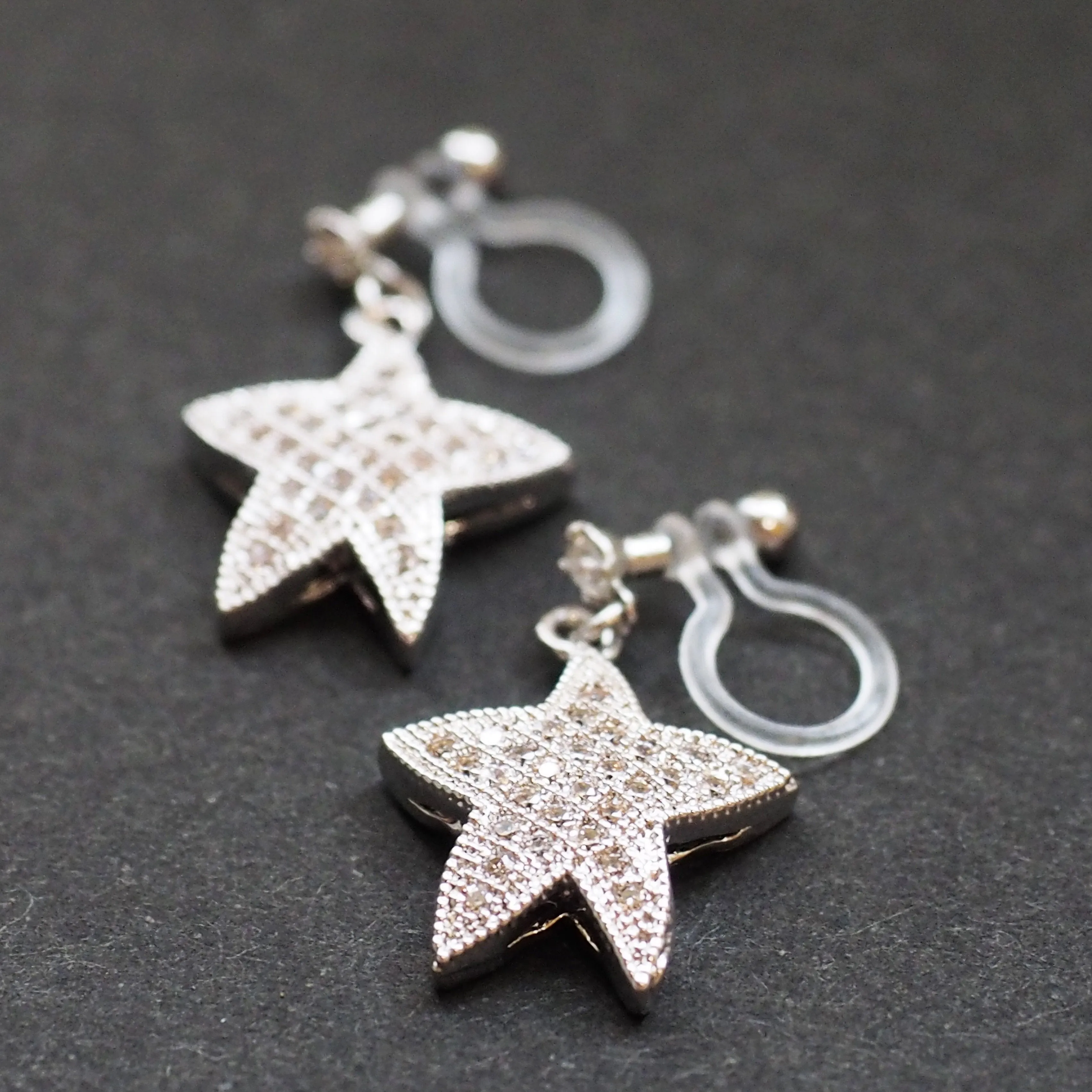 Star micro pave cubic zirconia invisible clip on earrings ( silver tone )