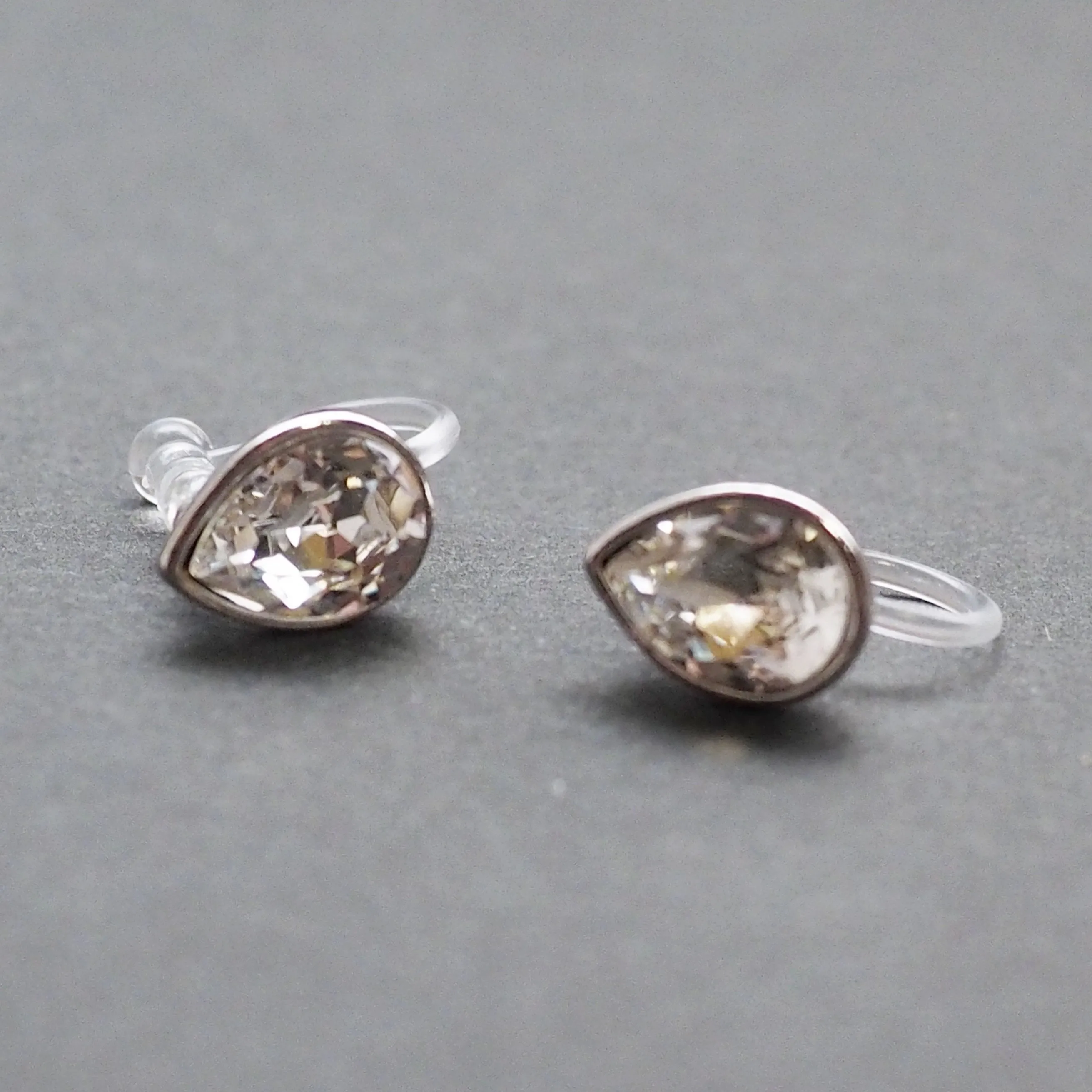Teardrop Cubic Zirconia Crystal Invisible Clip On Stud Earrings (Silver tone)