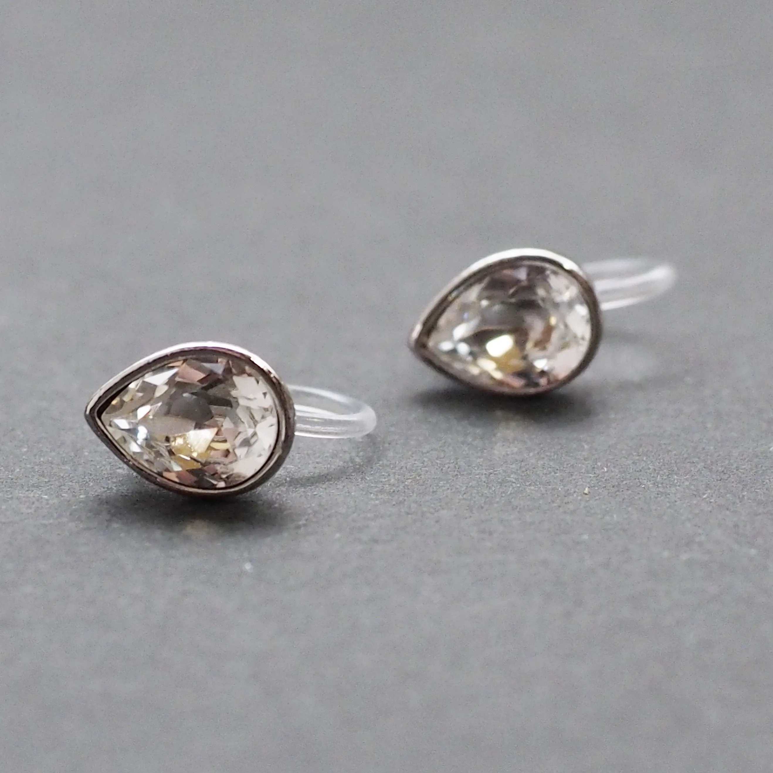 Teardrop Cubic Zirconia Crystal Invisible Clip On Stud Earrings (Silver tone)