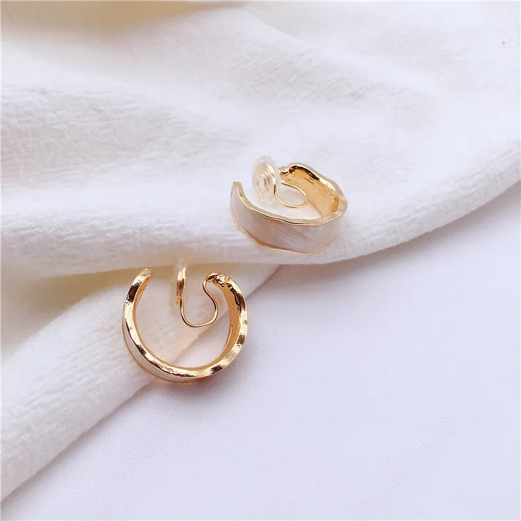 White Enamel Spiral Clip On Hoop Earrings